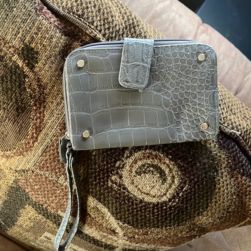 Gray wrislet/clutch. Brand new without tags.